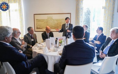 <div dir="auto"><strong>IMPORTANT ROLE.</strong> President Ferdinand R. Marcos Jr. (standing), accompanied by several members of his official delegation, attends a breakfast meeting on Jan 18, 2023 on the sidelines of the World Economic Forum in Davos, Switzerland. Marcos has emphasized the vital roles played by the Philippine delegation in securing important deals and in enhancing strategic investments and partnerships with key economic leaders. <em>(Photo courtesy of the Office of the President)</em></div>