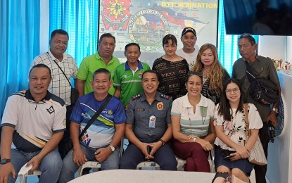 <p><strong>MEDIA SAFETY</strong>. Dumaguete City police officer in charge, Lt. Col. Ronoel Fungo, poses with members of the local media on Saturday (Jan. 21, 2023) after a safety and security seminar. The police chief said he will review the case files of the murders of three broadcast journalists in previous years that still remain unsolved. <em>(Photo by Judy Flores Partlow)</em></p>