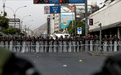 <p><strong>UNDER SIEGE</strong> Police intervene as protesters demand the resignation of the Peruvian President in Lima, Peru on Jan. 19, 2023. Protesters demanded general elections, the removal of President Dina Boluarte and justice for the protesters who died during clashes with the police. <em>(Anadolu)</em></p>