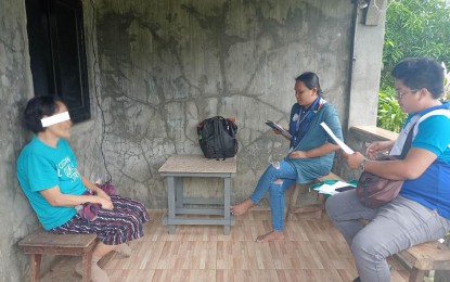 <p><strong>INTERVIEW</strong>. Philippine Statistics Authority statistical researcher Juliefe Sonio (center) is shown doing an interview as part of the agency's Consumer Expectations Survey (CES) in Pinamalayan, Oriental Mindoro on Saturday (Jan. 21, 2023). She was supervised by Emerson Caisip, regional focal person for Consumer Expectations Survey and Chief Statistical Specialist Ma. Leizl Magbojos. <em>(Photo courtesy of PSA-Mimaropa)</em></p>