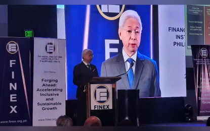 <p><strong>UPSKILLING.</strong> Trade Secretary Alfredo Pascual delivers his keynote speech during the inaugural meeting of the Finance Executives Institute of the Philippines at the New World Hotel on Monday (Jan. 23, 2022). Pascual highlighted the need to upskill and reskill the Filipino workforce so as not to lose jobs due to automation.<em> (PNA photo by Kris Crismundo)</em></p>