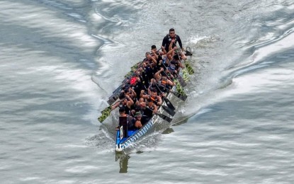 <p><strong>POWERHOUSE</strong>. The Philippine Army Dragon Warriors paddle their way to victory in the Mayor's Cup Spring Festival Dragon Boat Race in the Cagayan de Oro from Jan. 21 to Jan. 22, 2023. The Dragon Warriors have dominated local races since 2010.<em> (Photo courtesy of Philippine Army)</em></p>