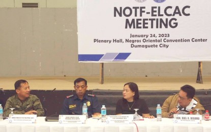 <p><strong>REORGANIZATION</strong>. Gov. Roel Degamo (far right) presides over a meeting of the Negros Oriental Task Force to End Local Communist Armed Conflict on Tuesday (Jan. 24, 2023) at the convention center in Dumaguete City. The meeting included the re-organization of the task force and the cluster reporting of accomplishments in 2022 to end communist insurgency. <em>(PNA photo by Judy Flores Partlow) </em></p>