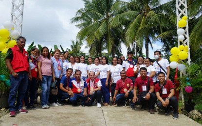 <p><strong>VOLUNTEER WORK.</strong>  Luzviminda Romero (5th from right, standing), president of a people's organization in the towns of San Miguel and San Remigio, Cebu province that supports the Department of Social Welfare and Development's KALAHI-CIDSS projects, poses with other volunteers from the community. Romero on Tuesday (Jan. 24, 2023) shared how the KALAHI-CIDSS project in the area molded her and other village folks to volunteer and join communal work, trainings and seminars. <em>(Photo courtesy of DSWD-7) </em></p>