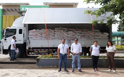 <p><strong>DONATION</strong>. Undated photo shows officials of the Department of Agriculture-Bicol sending off the truck containing 750 bags of inbred rice seeds donated by the agency to Eastern Visayas. The initial delivery is part of the 4,000 bags of inbred rice seeds from DA-5 aimed at helping in the immediate recovery of the rice areas in Region 8 that were severely affected by bad weather. <em>(Photo courtesy of DA-5)</em></p>