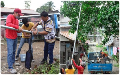 <p><strong>SOLAR LIGHTS.</strong> Workers under Kidapawan City's Task Force 'Kahayag' mount a solar light unit in a secluded portion of Barangay Poblacion on Wednesday (Jan. 25, 2023). The PHP4-million project aims to deter crimes and accidents in the city’s 40 villages. <em>(Photo courtesy of Kidapawan CIO)</em></p>