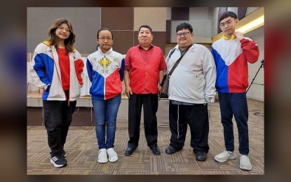 <p><strong>TEAM PHILIPPINES</strong>. The members of the chess delegation to the BKD Fide Rated International Open Under 21 in Tanggerang, Indonesia are (L-R) Woman National Master Antonella Berthe "Tonelle" Racasa, Jeanne Marie Arcinue, International Arbiter Bong Bunawan, delegation head National Master Almario Marlon Bernardino Jr., and National Master Ivan Travis Cu. <em>(Contributed photo) </em></p>