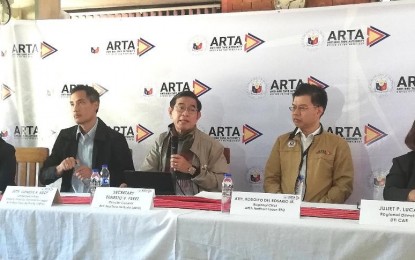 <p><strong>STREAMLINING.</strong> Anti-Red Tape Authority Director General Ernesto Perez (center) says the government is reaping the gains of streamlining the systems and procedures of government services, during a press conference held at the ARTA office located inside the NFA Compound, Loakan Road, Baguio City on Thursday (Jan. 26, 2023). He said he is optimistic that LGUs nationwide would be fully compliant with the ease of doing business law not only for the benefit of the government, but most importantly, for the clients who will reap the fruits of a shortened turnaround time in government transactions. <em>(PNA photo by Liza T. Agoot)</em></p>