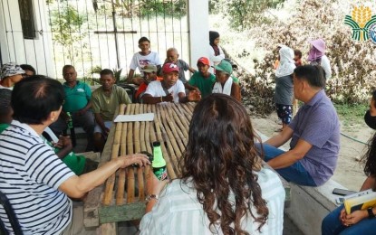 <p><strong>MARKET MATCHING. </strong>Officials of the Department of Agriculture meet with Aeta farmers in Barangay Nabuclod, Floridablanca, Pampanga on Wednesday (Jan. 25, 2023) to discuss the agency's market matching program. Through the program, the Aeta farmers will have sure markets for their agricultural produce. <em>(Photo courtesy of the DA Region III) </em></p>