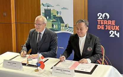 <p><strong>FRENCH CONNECTION</strong>. Philippine Olympic Committee (POC) President Abraham “Bambol” Tolentino (right) signs the memorandum of understanding with Moselle Sports Academy President Patrick Weiten in Mert City, France on Thursday (Jan. 26, 2023). <em>(Photo courtesy of POC) </em></p>