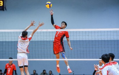 <p> </p>
<p>John Paul Bugaoan of Cignal against two Santa Rosa City defenders during their match in the Spikers' Turf Open Conference at the Paco Arena on Friday (Jan. 27, 2023). Cignal won, 25-19, 25-18, 25-17.<em> (Photo courtesy of Philippine Volleyball League) </em></p>