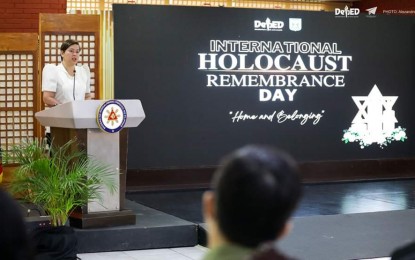 <p><strong>NEVER FORGET</strong>. Vice President and Education Secretary Sara Duterte delivers her message during the international remembrance day for the Holocaust victims on Thursday (Jan. 26, 2023). Duterte urged the public to never forget the lessons brought by the hateful oppression against the Jewish people in history. <em>(Photo courtesy of the Department of Education)</em></p>