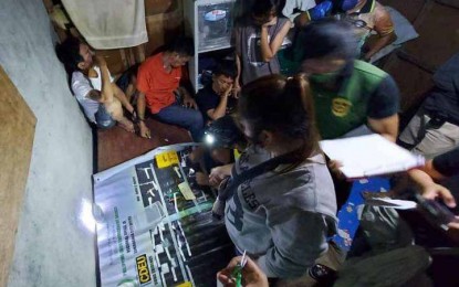 <p><strong>DRUG DEN</strong>. Authorities arrest four drug suspects as they dismantle a drug den in Barangay Tugbungan, Zamboanga City on Thursday (Jan. 26, 2023). Some PHP930,172 worth of suspected shabu were seized in anti-drug operations during the week in the region. <em>(Photo courtesy of Zamboanga City Police Office)</em></p>