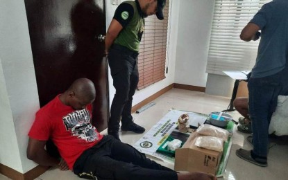 <p><strong>BUSTED</strong>. Nigerian national Valentine Ebuka Ezike (on the floor) is nabbed in a drug buy-bust by the Philippine Drug Enforcement Agency on Saturday (Jan. 28, 2023). Seized from him were suspected illegal drugs with an estimated value of PHP17 million. <em>(Photo courtesy of PDEA)</em></p>