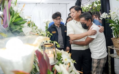 <p><strong>SYMPATHY</strong>. President Ferdinand R. Marcos Jr. visits the wake of slain overseas Filipino worker Jullebee Cabilis Ranara in Las Piñas City on Monday (Jan. 30, 2023) to personally extend his sympathies to the bereaved family. 2023).  Marcos assured Ranara’s family that they would receive assistance from the government. <em>(Photo courtesy of PCO)</em></p>