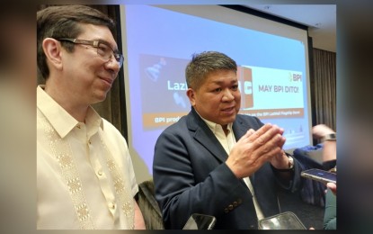 <p><strong>MORE TIE-UPS.</strong>  Ayala-led Bank of the Philippine Islands (BPI) president and chief executive officer (CEO) Jose Teodoro Limcauco (left) said the bank eyes to increase its customer base this year through tie-ups with non-bank entities. On Tuesday (Jan. 31, 2023), the bank launched its partnership with electronic commerce (e-commerce) player Lazada.  BPI Senior Vice President for Retail Banking Jose Raul Jereza (right) said he will be happy to have at least 10 percent of Lazada's 80 million customers to be BPI account holders or clients by the end of 2023.<em> (Photo by Joann Santiago-Villanueva)</em></p>