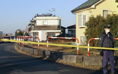 <p><strong>SENSELESS.</strong> Police watch over the crime scene at the home of 90-year-old Kinuyo Oshio, who was killed in a robbery-murder in the city of Komae in western Tokyo on Jan. 19, 2023. The suspects are reportedly gang members of suspected burglary ring leader suspect Yuki Watanabe (alias Luffy) who has been detained at the Bureau of Immigration detention center in Bicutan, Taguig since 2021. <em>(Courtesy of Kyodo)</em></p>