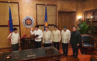 <p><strong>NEW DSWD CHIEF.</strong> President Ferdinand R. Marcos Jr. administers the oath of office to Valuenzuela 1st District Rep. Rex Gatchalian as the new secretary of the Department of Social Welfare and Development on Tuesday (Jan. 31, 2023). Senators said Gatchalian's experience as a local chief executive would make a good difference in the DSWD. <em>(Screenshot from the Presidential Communications Office)</em></p>