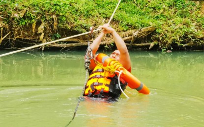 <p><strong>DISASTER RESPONSE TRAINING.</strong> A member of the 2nd Infantry “Junglefighter” Division undergoes a water search and rescue training exercise at Camp General Mateo, Capinpin, Tanay, Rizal on Jan. 30, 2023. The Philippine Army said Wednesday (Feb. 1, 2023) the holding of the disaster response training complies with PA chief Gen. Romeo Brawner Jr.'s calls for the enhancement of unit capabilities and soldiers’ skills. <em>(Photo courtesy of the Philippine Army)</em></p>