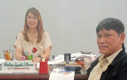 <p><strong>TOURIST ARRIVALS UP.</strong> Legazpi Tourism Office (CTO) chief Cristina Agapita Pacres (left) is shown in an interview with the Philippine News Agency on Wednesday (Feb. 1, 2023). She said the number of visitors in Legazpi City shot up in 2022 to 291,391 or a 197-percent increase compared to the 98,086 tourist arrivals in 2021. <em>(Photo courtesy of Legazpi CTO)</em></p>