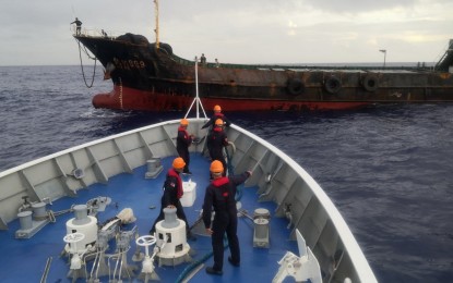 <p><strong>RESCUED.</strong> Philippine Coast Guard (PCG) personnel towing a Chinese vessel rescued off the coast of Eastern Samar in this Jan. 27, 2023 photo. Eastern Samar Governor Ben Evardone has called for an investigation into why a Chinese vessel reached the island village of Suluan in Guiuan town. <em>(Photo courtesy of PCG Eastern Visayas)</em></p>