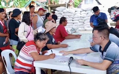 <p><strong>FREE SEEDS.</strong> Rice farmers in Eastern Samar province badly hit by recent flooding receive replacement seeds to recover losses from the Department of Agriculture (DA) in this Jan. 27, 2023 photo. Latest report said damage and losses to agriculture in the region due to severe flooding in the first two weeks of January are now pegged at PHP611.1 million. <em>(Photo courtesy of DA Eastern Visayas)</em></p>