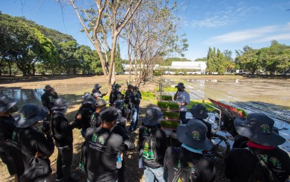 <p><strong>TECHNOLOGY DEMO</strong>. Members of farmers' cooperatives and associations witness a demonstration of farm machinery at the PhilMech compound, Science City of Muñoz, Nueva Ecija on Tuesday (Jan. 31, 2023). After the demonstration, the farmers expressed their interest to adopt and utilize the crop establishment technologies under the Rice Competitiveness Enhancement Fund (RCEF) mechanization program. <em>(Photo courtesy of DA-PhilMech)</em></p>