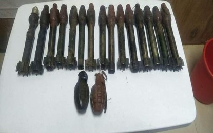 <p><strong>RECOVERED.</strong> Two hand grenades and 15 rifle grenade projectiles are retrieved by the Dinagat Islands Police Provincial Office (DIPPO) in Barangay Luna, San Jose, Dinagat Islands on Thursday (Feb. 2, 2022). An investigation is underway to determine those behind the concealment of the explosives. <em>(Photo courtesy of DIPPO)</em></p>