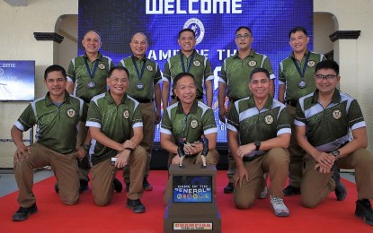 <p><strong>CHAMPION. </strong>Philippine Army Commanding General Lt. Gen. Romeo S. Brawner Jr. and the Army team which won the Team vs. Team category during the Philippine Navy-hosted Game of the Generals at the Philippine Marines Firing Range on Tuesday (Jan. 31, 2023). <em>(Philippine Army photo) </em></p>
