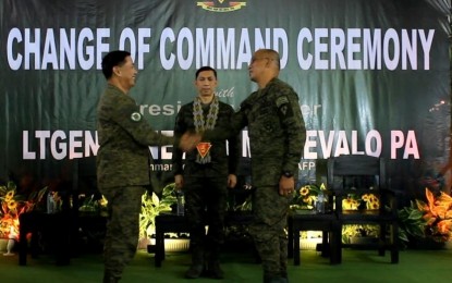 <p><strong>CHANGE OF COMMAND</strong>. Lt. Gen. Benedict Arevalo (center), commander of the Armed Forces of the Philippines Visayas Command, during the turnover of command from Col. Michael Samson (left) to Col. Orlando Edralin at the Philippine Army’s 303rd Infantry Brigade in Murcia, Negros Occidental on Jan. 31, 2023. Arevalo said he has instructed the brigade and battalion commanders to address the spate of killings perpetrated by the CPP-NPA in Negros Island. <em>(Photo courtesy of 303rd Infantry Brigade, Philippine Army)</em></p>