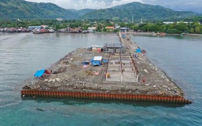 <p><strong>DREAM PROJECT.</strong> Site of the modern fish port complex in Mati City, Davao Oriental province. The local government said on Friday (Feb. 3, 2023) that it has secured an additional budget of PHP150 million for the second phase of the complex and PHP2 billion for the 2.25-kilometer road access and coastal highway. <em>(Courtesy of City of Mati)</em></p>
