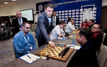 <p><strong>MEDAL HUNT.</strong> FIDE Master Sander Severino and National Master Henry Roger Lopez (1st and 2nd from left, right side) during the opening of the 1st FIDE Chess Olympiad for People with Disabilities at the Crowne Plaza Hotel in Belgrade, Serbia on Jan. 29, 2023. As of Feb. 3, the Philippines is in a four-way tie for third place with Israel, India and Hungary after five rounds. <em>(Contributed photo)</em></p>