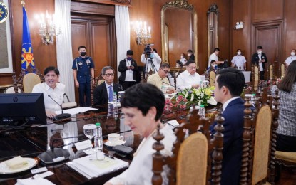 <p><strong>ENERGIZED.</strong> President Ferdinand R. Marcos Jr. (left) meets with San Ignacio Energy Resources Development Corporation executives who gave him a briefing on the 440-megawatt Peak Solar Power Project at Malacañan Palace in Manila on Feb. 1, 2023. The company will begin construction next year on a 400-hectare land in Ilagan City, Isabela. <em>(Courtesy of Office of the President)</em></p>
