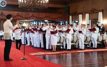 <p><strong>AGILE.</strong> President Ferdinand R. Marcos Jr. leads the oath-taking ceremony of generals and flag officers of the Armed Forces of the Philippines at Malacañan Palace on Monday (Feb. 6, 2023). In his speech, he urged the military to "keep up with the times" and be more agile in fostering partnerships as the global situation becomes "more and more complicated." <em>(Photo courtesy of the Office of the President)</em></p>