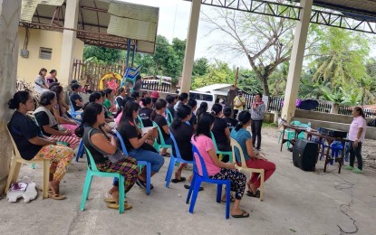 <p><strong>FAMILY SESSIONS</strong>. Beneficiaries of the Pantawid Pamilyang Pilipino Program (4Ps) in the island group of Camotes in Cebu province listen to provincial link Brigieda Goron during a meeting in this undated photo. DSWD-7 regional director Shalaine Marie Lucero on Tuesday (Feb. 7. 2023) said they have resumed the face-to-face family development sessions with the 4Ps beneficiaries to address concerns involving the conditional cash transfer. <em>(Photo courtesy of DSWD-7)</em></p>