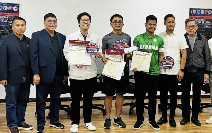 <p><strong>CHAMPION.</strong> Grandmaster Darwin Laylo (center) rules the Philippine National Chess Championship Grand Finals at the Malolos City Hall on Tuesday (Feb. 7, 2023). From left are National Chess Federation of the Philippines (NCFP) executive officer Jayson Gonzales, chairman and president Rep.Prospero "Butch" Pichay Jr., IM Jan Emmanuel Garcia (2nd place), IM Michael Concio Jr. (3rd place), Malolos City Vice Mayor Miguel Alberto Bautista and Asia's First Grandmaster Eugene Torre.<em> (Contributed photo)</em></p>