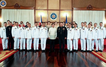 <p><strong>PROMOTION SYSTEM</strong>. President Ferdinand R. Marcos Jr. poses for a photo opportunity with newly sworn in Armed Forces of the Philippines (AFP) generals and flag officers at Malacañan Palace on Tuesday (Feb. 7, 2023). Marcos said he wants to “rationalize” the AFP promotion system.<em> (Photo courtesy of the Office of the President)</em></p>