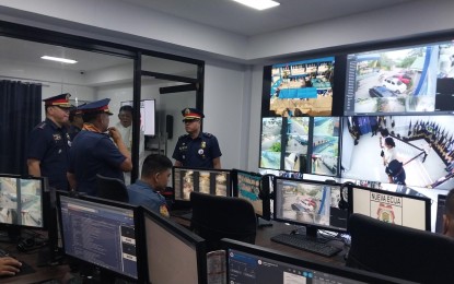 <p><strong>COMMAND CENTER</strong>. Central Luzon police officials, led by Brig. Gen. Cesar Pasiwen, inspect the new command center at the Nueva Ecija Police Provincial Office in Cabanatuan City, Nueva Ecija on Tuesday (Feb. 7, 2023). The establishment of the command center was funded by the Philippine National Police main office.<em> (PNA photo by Marilyn Galang)</em></p>