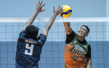 <p><strong>TOP SCORER</strong>: Patrick John Rojas (No. 12) in action during the Philippine Army's 25-19, 25-22, 22-25, 25-18 win over Vanguard in the Spikers’ Turf Open Conference at the Paco Arena in Manila on Wednesday (Feb. 8, 2023). Rojas led the Troopers with 16 points. <em>(Premier Volleyball League photo)</em></p>
