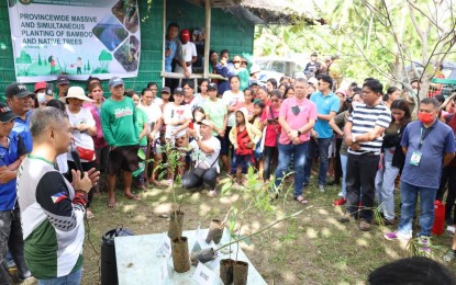 <p><strong>TREES VS. FLOODS</strong>. A province-wide massive and simultaneous planting of bamboo and native trees was carried out in Oriental Mindoro on Friday (Feb. 10, 2023) with Gov. Humerlito Dolor (left) in a village in Baco town. The trees are seen to help mitigate flooding woes in the province.<em> (Photo courtesy of Provincial Information Office-Oriental Mindoro)</em></p>