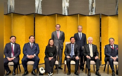 <p><strong>GREENER FUELS</strong>. It is synergy in action as the Philippine government is working closely with the Japanese private sector to commence a joint study on ammonia co-firing for the decarbonization for greener fuels. In photo, (seated from left) Senator Mark Villar, House Speaker Martin Romualdez, former President Gloria Macapagal-Arroyo, Philippine President Ferdinand R. Marcos Jr., Department of Trade and Industry Secretary Alfredo Pascual, Special Assistant to the President Antonio Lagdameo Jr., together with AboitizPower chairman Sabin Aboitiz and JERA president Satoshi Onoda (standing). <em>(Photo and caption from AboitizPower)</em></p>