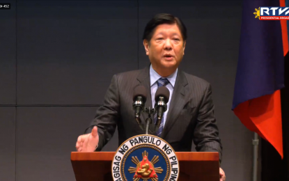 <p><strong>GAME-CHANGING REFORMS.</strong> President Ferdinand R. Marcos Jr. assures the Japanese business community that his administration is pursuing "vital and game-changing" reforms to improve the Philippines' business environment, in a speech delivered in Tokyo on Friday (Feb. 10, 2023). Marcos made the assurance after witnessing the signing of 35 letters of intent and agreements between the Philippines and Japan. <em>(Screenshot from Radio Television Malacañang)</em></p>