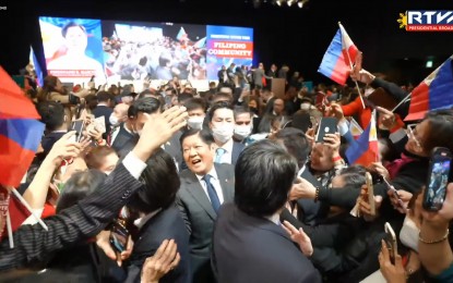 <p><strong>FEELS LIKE HOME.</strong> President Ferdinand R. Marcos is swarmed by supporters during his meeting with the Filipino community in Japan at Belle Salle Tokyo Nihonbashi in in Chuo City on Sunday (Feb. 12, 2023). The President wrapped up his five-day state visit with the assurance to Filipino workers that the government is continuously finding ways to make quality jobs available at home. <em>(Screengrab from RTVM) <strong> </strong></em></p>