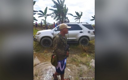 <p><strong>AMBUSHED.</strong> A police officer stands near the Toyota Fortuner of Haviv Macabangen Maindan, municipal election officer of Sultan sa Barongis, Maguindanao del Sur province, who was killed in an ambush Monday afternoon (Feb. 13, 2023) in Lambayong town, Sultan Kudarat province. Investigation into the incident is still going on. <em>(Photo courtesy of Lambayong MPS)</em></p>