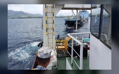 <p><strong>RESCUED SEA VESSEL.</strong> The Philippine Coast Guard in North Eastern Mindanao and Dinagat Islands successfully towed to safety a distressed cargo vessel that suffered engine failure off the coast of Hibusong Island on Sunday (Feb. 12, 2023). The troubled sea vessel is now anchored at the harbor of Loreto town in Dinagat Islands province. <em>(Photo courtesy of PCG-NEM)</em></p>