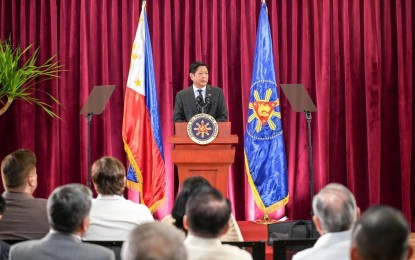 <p>President Ferdinand R. Marcos Jr. delivers his arrival speech at the Villamor Air Base in Pasay City after his succesful five-day working visit to Tokyo, Japan.<em> (Photo courtesy of Presidential Communications Office) </em></p>