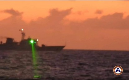 <p><strong>SUPPLY MISSION. </strong>A China Coast Guard vessel with bow number 5205 directed a military-grade laser light at the Philippine Coast Guard (PCG) vessel BRP Malapascua (MRRV-4403) while supporting a rotation and resupply mission of the Philippine Navy in Ayungin Shoal in the West Philippine Sea on Feb. 6, 2023. <em>(Photo courtesy of the PCG)</em> </p>