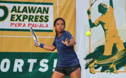 <p><strong>WINNER.</strong> Melanie Faye Dizon makes a forehand return during a tournament last week. Dizon led Ateneo to a 3-2 victory over the University of the Philippines in the National Collegiate Tennis Championships at the Philippine Columbian Association outdoor shell courts in Paco, Manila on Feb. 15, 2023. <em>(Contributed photo)</em></p>