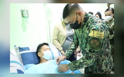 <p><strong>MEDAL.</strong> Brig. Gen. John Guyguyon, Police Regional Office-Bangsamoro Autonomous Region (PRO-BAR) director, awarded the Medalya ng Sugatang Magiting (PNP Wounded Personnel Medal) to Corporal Sammy Marohom, who was wounded in an ambush on Feb. 11, 2023 in Picong, Lanao del Sur. Col. Richard Verceles, operations chief of the Area Police Command-Western Mindanao, said Thursday (Feb. 16, 2023) that a manhunt is underway against the suspects in the ambush that also resulted in the death of Staff Sergeant Albert Magdayao. <em>(Photo lifted from PRO-BAR Facebook Page)</em></p>