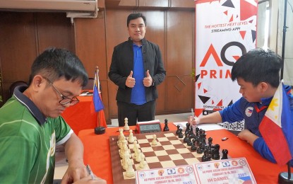 <p><strong>OPTIMISTIC</strong>. National champion GM Darwin Laylo (left) against IM Daniel Quizon during their match in the AQ Prime ASEAN Chess Championship at the Great Eastern Hotel in Quezon City on Fe.Bbruary 15, 2023. The match ended in a draw. <em>(Contributed photo)</em></p>
